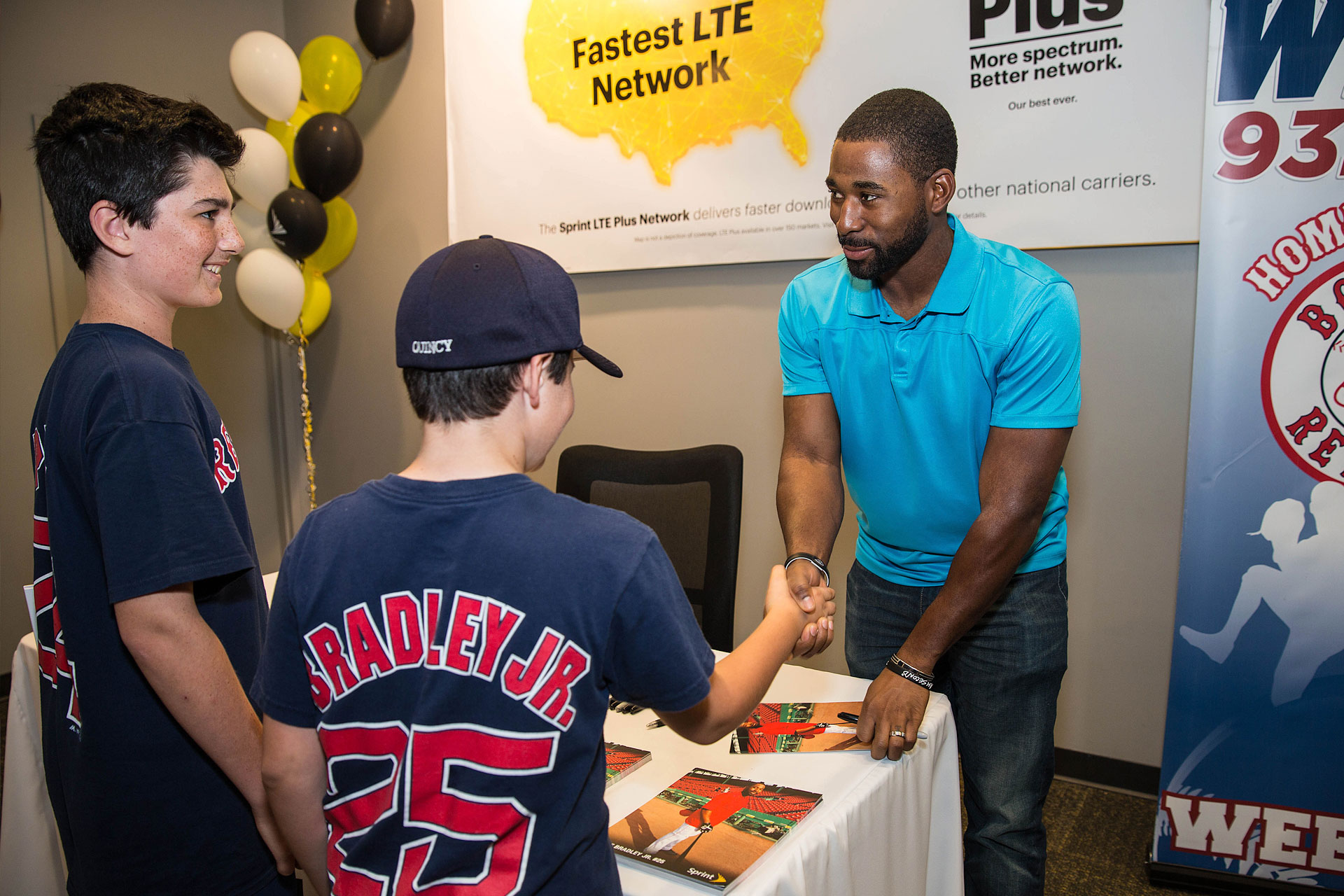 Jackie Bradley Jr. Signs Autograph for Young Fans
