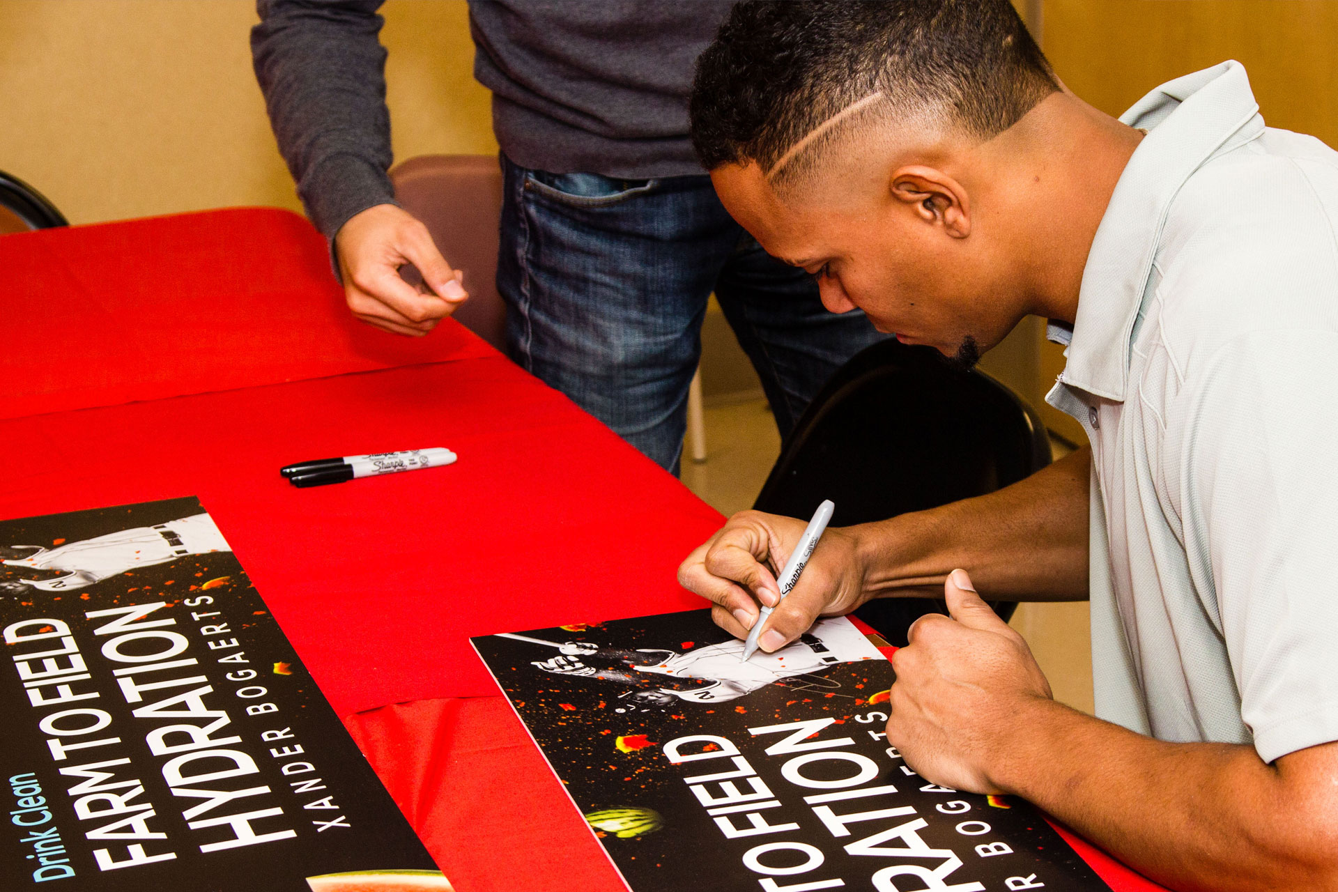 Xander Bogaerts Signs Poster for WTRMLN WTR at Stop N Shop Appearance